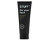 Black tube of 'STUFF for your face' on a white background